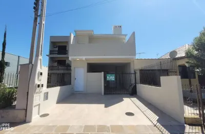 Casa com 2 quartos e 2 vagas para alugar no centro de dois irmãos