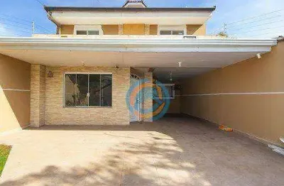 Sobrado com 4 dormitórios à venda, 160 m² por R$ 622.000 - Uberaba - Curitiba/PR