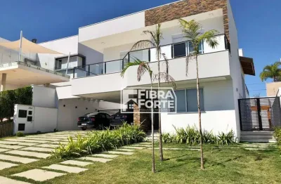 Casa para venda em condominio fechado na região do alphaville com 4 suítes.