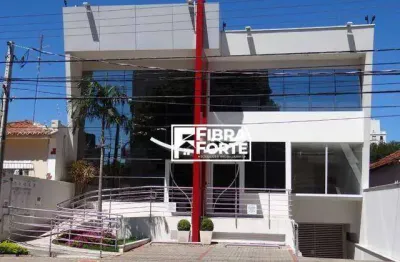 Prédio comercial com 15 salas e 15 vagas no guanabara com elevador