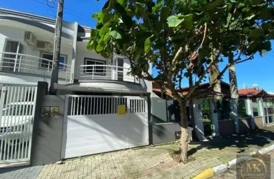 Sobrado germinado 4 dormitórios sendo 1 suíte + 1 vaga de garagem pagamento facilitado proprietário em meia praia de itapema