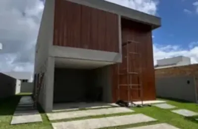 Vendo casa de 4/4, sendo 03 suites, com area privativa de 294 m², infraestrutura de clube completa - localização privilegiada - no condomínio alphaville litoral norte 2 - na estrada do coco