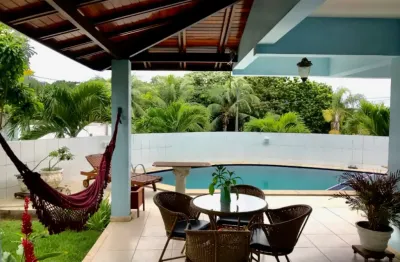 Vendo casa de 5/4, sendo 02 suites, com area privativa de 420 m², infraestrutura de clube completa - localização privilegiada - no condomínio vila do bosque - na estrada do coco.