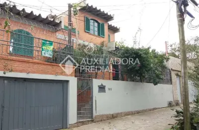 Casa em condomínio fechado com 3 quartos à venda na rua cuiabá, 308, medianeira, porto alegre, 140 m2 por r$ 395.000