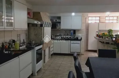 Casa em condomínio fechado com 3 quartos à venda na Rua Crisantemo, 684, Cecília, Viamão, 168 m2 por R$ 659.500