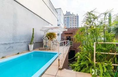 Casa em condomínio fechado com 3 quartos à venda na rua coronel bordini, 822, auxiliadora, porto alegre, 198 m2 por r$ 1.390.000