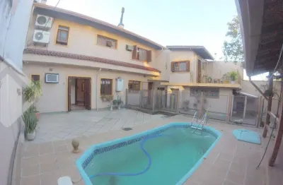 Casa em condomínio fechado com 5 quartos à venda na Rua Doutor Fernando Ortiz Schneider, 43, Partenon, Porto Alegre, 375 m2 por R$ 1.450.000