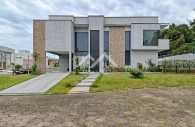 Casa alto padrão em condomínio fechado em peruíbe, com 4 quartos sendo 3 suítes e área de lazer com piscina