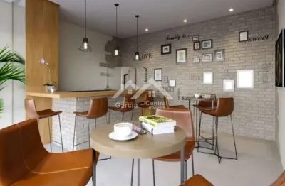 Apartamento novo, com prédio frente mar, com 2 dormitórios (1 suíte)