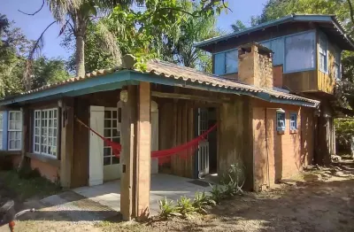 Casa em condomínio fechado com 3 quartos à venda na geral do ouvidor, 110, campo duna, garopaba, 200 m2 por r$ 800.000