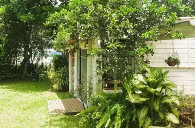 Casa com 4 quartos à venda na domingos tomé marques, 15, ibiraquera, imbituba, 150 m2 por r$ 1.650.000