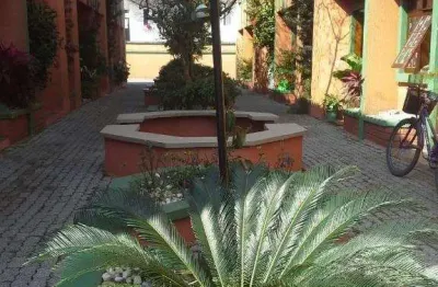 Casa em condomínio fechado com 2 quartos à venda na rua chile, 806, enseada, guarujá, 65 m2 por r$ 300.000