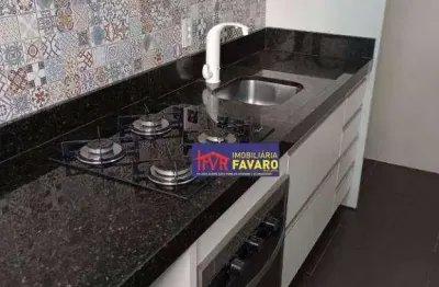 Spazio lyon apartamento térreo, dois quartos, sendo o quarto de casal com armário planejado, sala, cozinha planejada com balcões em marmore .cooktop,