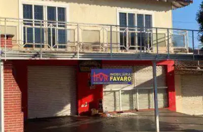 Esquina comercial contendo:  apartamento tipo sobreloja com 2 quartos, sala ampla, cozinha, área de serviço e varanda. salão térreo com 75m2 interno,