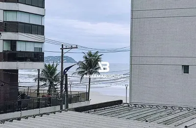 Astúrias- na calçada da praia , maravilhoso apartamento , 02 vagas de garagem no prédio.