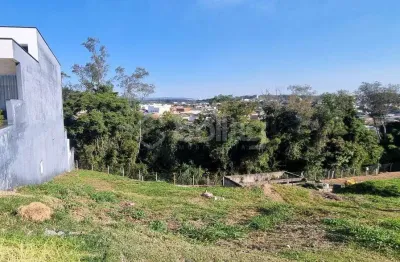 Terreno à venda com 396m em declive , vista livre no condomínio reserva dos jatobás em louveira.