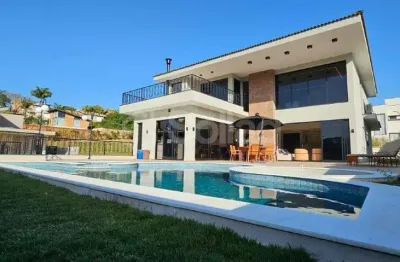 Casa nova a venda no condomínio arboretum em vinhedo - sp são 4 suítes sendo 02 c closet (uma com varanda), 02 c/ armários e todas c/ ar condicionado