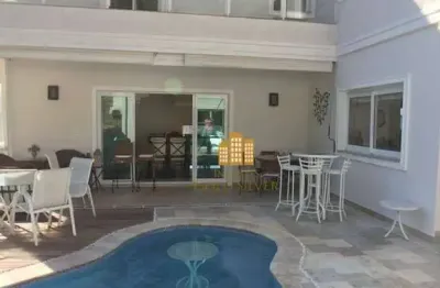 Casa com ar condicionado nas 5 suítes ,7 vagas , espaço gourmet , piscina aquecida , à venda, 460 m² por r$ 3.800.000 - alphasítio alphaville /sp