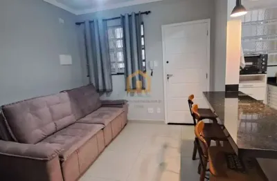 Kitnet reformada com quarto separado na avenida da praia à venda no bairro gonzaga - santos/sp