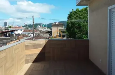 Casa triplex - frente - bairro esplanada dos barreiros - são vicente.