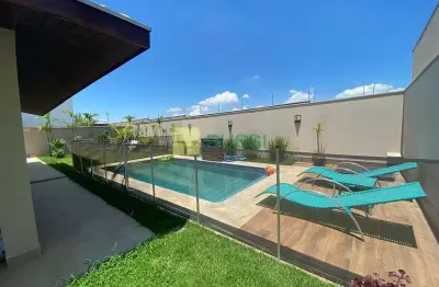 Sobrado com 4 dormitórios à venda, 400 m² por r$ 2.700.000,00 - condomínio residencial jaguary - sã