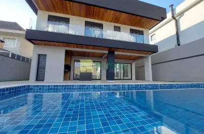 Sobrado com 4 dormitórios à venda, 450 m² por r$ 2.900.000,00 - condomínio residencial jaguary - sã