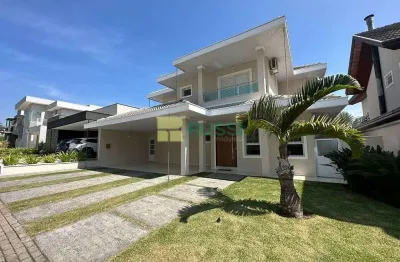 Sobrado com 4 dormitórios à venda, 337 m² por r$ 2.980.000,00 - condomínio residencial jaguary - sã