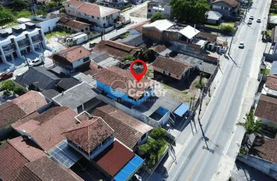 Sobrado com sala comercial no bairro costeira, balneário barra do sul, sc