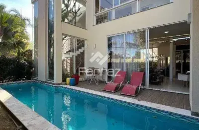 Casa em condomínio fechado à venda, 4 suítes, 2 vagas, jardins barcelona - uberlândia/mg