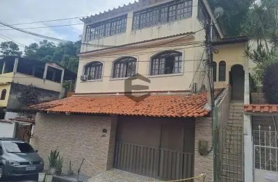 Casa com 3 quartos à venda na Travessa Doutor Benevenuto Gomes Soares, Cubango, Niterói, 116 m2 por R$ 295.000