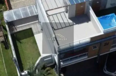 Venda de Casa de Alto Padrão em Condomínio - 2 quartos, 2 suítes, 2 salas, 3 banheiros, 1 vaga de garagem - Caraguatatuba-SP, Balneário Garden Mar - 199,00 m².