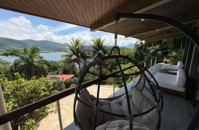 Casa de luxo em condomínio à venda em toninhas, ubatuba-sp: 5 quartos, 3 suítes, 3 salas, 5 vagas de garagem, 450m² de área.