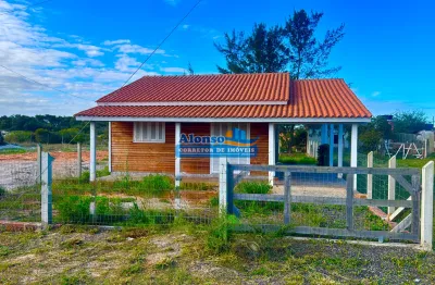 Casa mobiliada com 03 quartos e terreno inteiro 700 metros do mar em arroio do sal