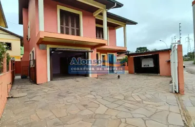 Ampla casa com 03 quartos e suíte em ótima localização no bairro desvio rizzo