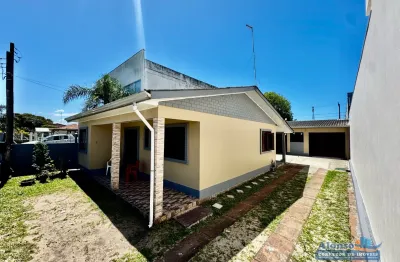 Casa com 02 moradias no centro de arroio do sal próximo à rodoviária