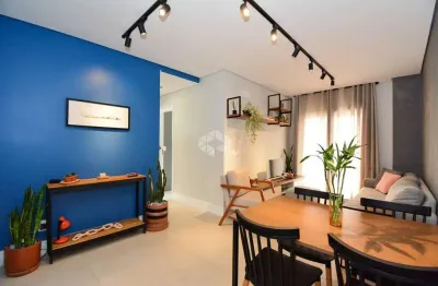 Apartamento à venda com 2 quartos sendo 1 suíte e 1 vaga de garagem no bairro centro em são josé/sc.