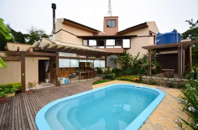 Casa residencial à venda com 4 quartos sendo 1 suítes e  3 vaga de garagem no bairro centro em são josé/sc