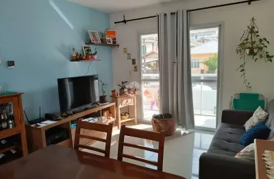 Apartamento no bairro pagani, em palhoça, sc, semi-mobiliado, sacada, churrasqueira, 02 dormitórios, e 01 vaga de garagem.