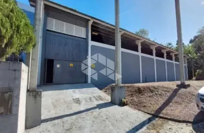 Pavilhão no bairro potecas, em são josé, sc, medindo 1,100m² de área total.