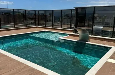 Apartamento 2 dormitorios com suíte, vaga de garagem piscina no bairro campinas são josé/SC