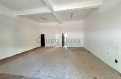 Salão comercial à venda com residências nos fundos no bairro Parque Arariba.