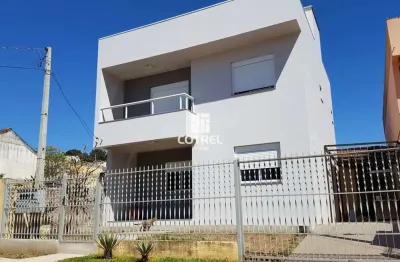 Casa 03 dormitórios e 03 vagas de garagem no bairro camobi