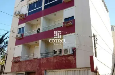 Apartamento central 2 dormitórios sendo 1 suíte e 1 vaga de garagem localizado n
