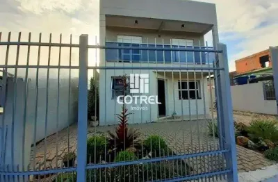 Casa 4 dormitórios 1 suíte 2 vagas de garagem localizada no bairro urlândia na c
