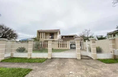 Excelente casa para venda com 4 dormitórios 2 sendo suíte, 2 salas, piscina, 2 v