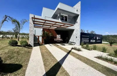 Casa em condomínio fechado com 3 dormitórios, suíte e 2 vagas de garagem