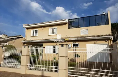Casa 3 dormitórios sendo 2 suítes e 2 vagas de garagem no bairro camobi localiza