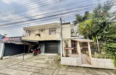 Casa para locação com 3 dormitórios 1 sendo suíte, 2 vagas de garagem situado no