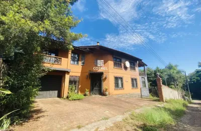 Casa à venda 3 dormitórios sendo 1 suíte, sacada, lareira e 1 vaga de garagem si