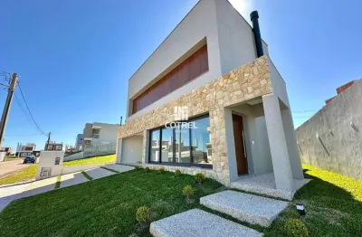 Casa à venda 4 dormitórios sendo 2 suítes, 2 vagas de garagem, situado no bairro